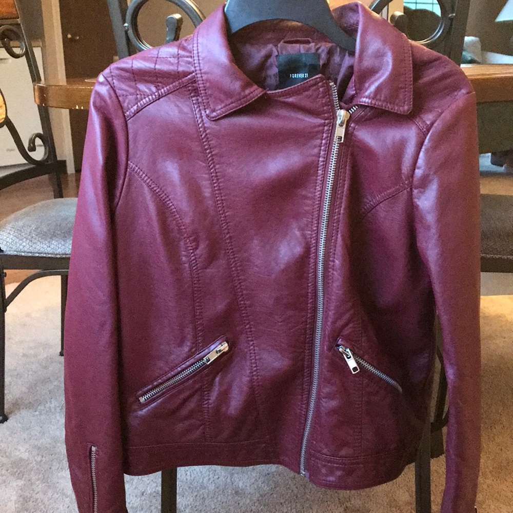 Leather jacket with zipper details